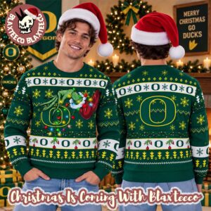 Grinch NCAA Oregon Ducks Grinch Hand Holiday Gift 2026 Christmas Ugly Sweater